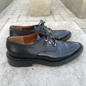 Authentic Givenchy Black Leather Flats with Studded Detail